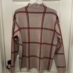 Lightly used Tahari plaid sweater. Classic style.